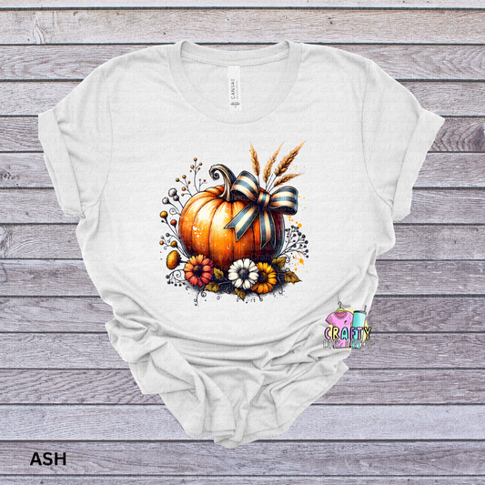Pumpkin with bow and flowers